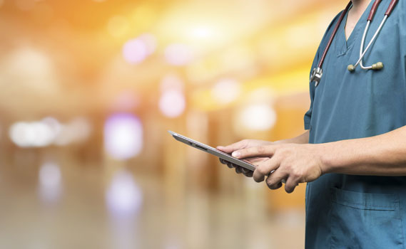 Nurse with ipad in hand