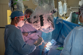 Dr. Robin performing surgery