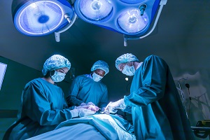 Heart surgeons performing a medical procedure
